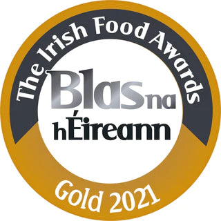Irish Food Award gold winner logo. A circular image with the words The Irish Food Awards, Blas na hEireann Gold 2021
