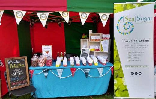 a picture of a very colourful SeaSugar market stall